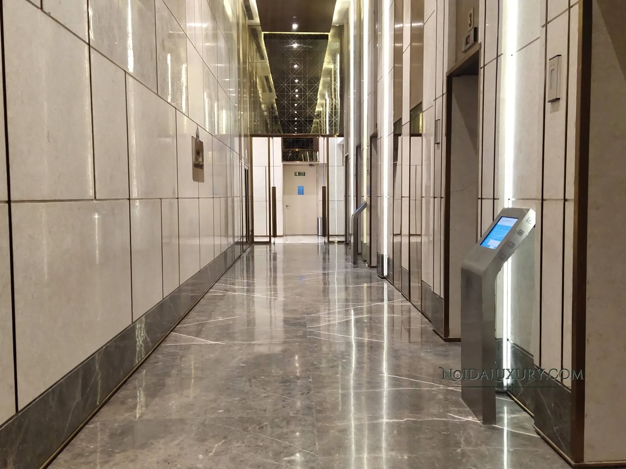 Supertech Supernova Nova Residences entrance and towers – gated community with landscaped greens